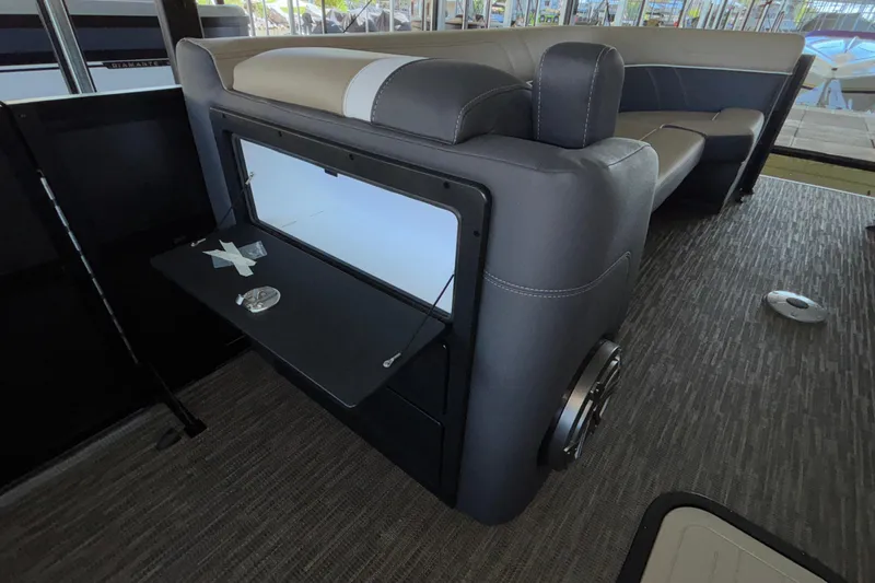 Slide: The Image of Interior of 2026 Viaggio Z24U boat with open storage compartment and seating area. - 40