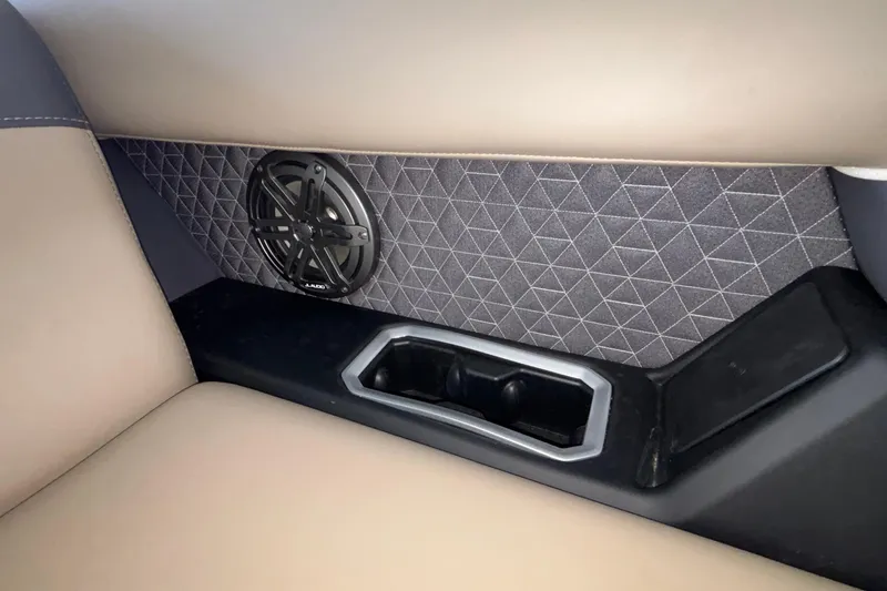 Slide: The Image of Rear seat speaker and cup holder in 2026 Viaggio Z24U with quilted panel design. - 46