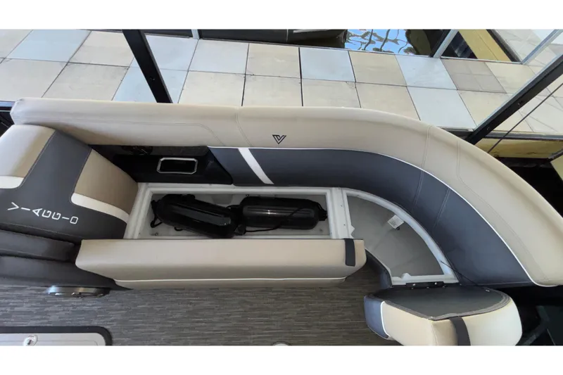 Slide: The Image of 2026 Viaggio Z24U boat interior with open storage compartment and cushioned seating. - 47