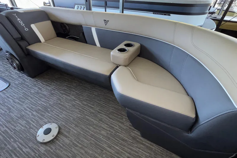 Slide: The Image of Luxurious Viaggio Z24U 2026 boat seating with cup holders, featuring elegant beige and gray upholstery. - 49