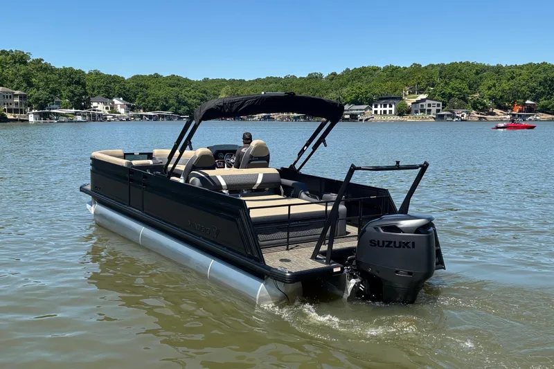 Slide: The Image of 2026 Viaggio Z24U pontoon boat with Suzuki engine on a scenic lake. - 6