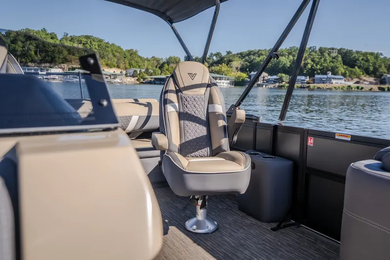 Slide: The Image of 2026 Viaggio Z24S boat interior with luxurious seating on a serene lake. - 27