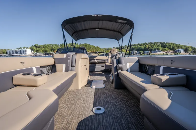 Slide: The Image of Luxurious 2026 Viaggio Z24S pontoon boat interior with plush seating and canopy. - 31