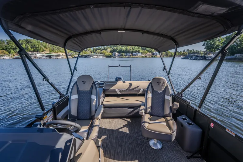 Slide: The Image of 2026 Viaggio Z24S pontoon boat interior on a serene lake. - 36