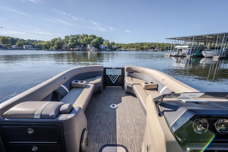 Slide: The Image of Luxurious 2026 Viaggio Z24S pontoon boat interior on a serene lake. - 38