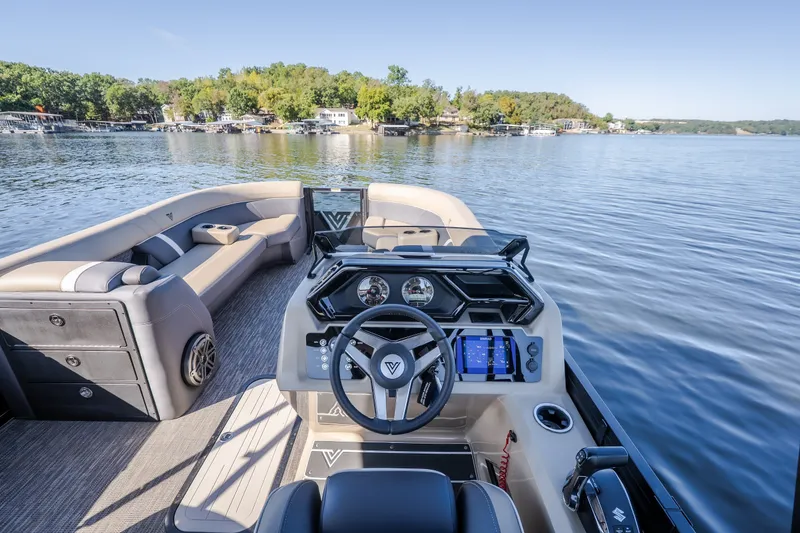 Slide: The Image of Luxurious 2026 Viaggio Z24S pontoon boat interior with modern dashboard on a serene lake. - 43