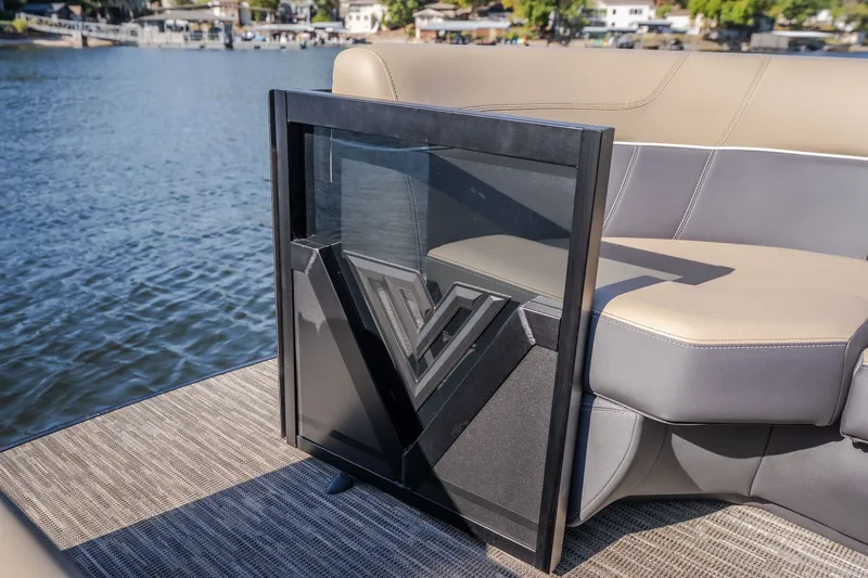 Slide: The Image of 2026 Viaggio Z24S boat interior with modern seating and sleek design by the water. - 34