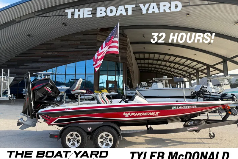The Image of 2019 Phoenix 819 Pro boat at The Boat Yard, 32 hours used, American flag displayed. - 1