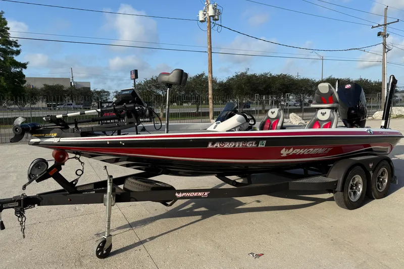 Slide: The Image of 2019 Phoenix 819 Pro fishing boat on trailer, parked outdoors. - 10