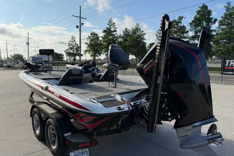 Slide: The Image of 2019 Phoenix 819 Pro boat with Mercury engine on a trailer in a parking lot. - 5