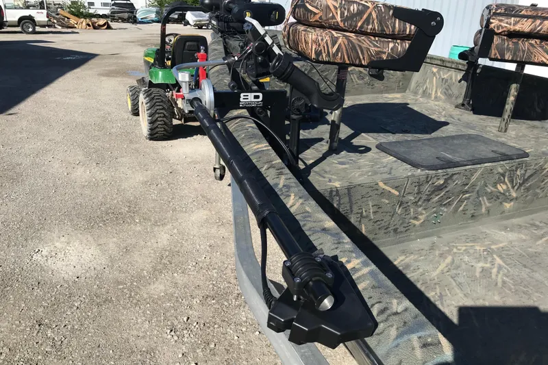 Slide: The Image of 2015 War Eagle 961 Blackhawk boat with camouflage seats and mounted equipment. - 12