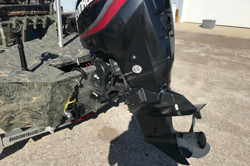 Slide: The Image of 2015 War Eagle 961 Blackhawk boat with outboard motor on trailer. - 6