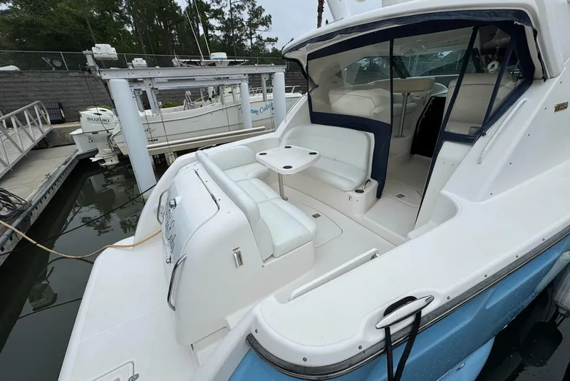Slide: The Image of 2008 Tiara Yachts 3500 Sovran with spacious seating at the dock. - 6