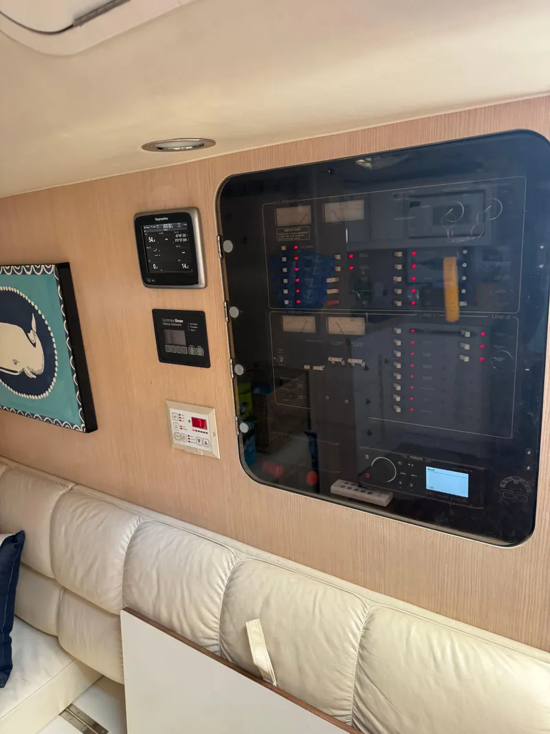 Slide: The Image of Interior of 1996 Tiara Yachts 3500 Express with control panel. - 22
