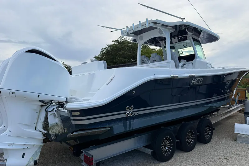 The Image of 2020 HCB 39 Speciale boat on trailer, featuring sleek design and powerful engines. - 0