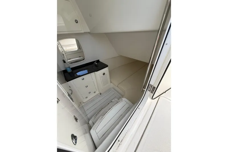 Slide: The Image of Interior cabin of 2020 HCB 39 Speciale boat with sink and seating area. - 12