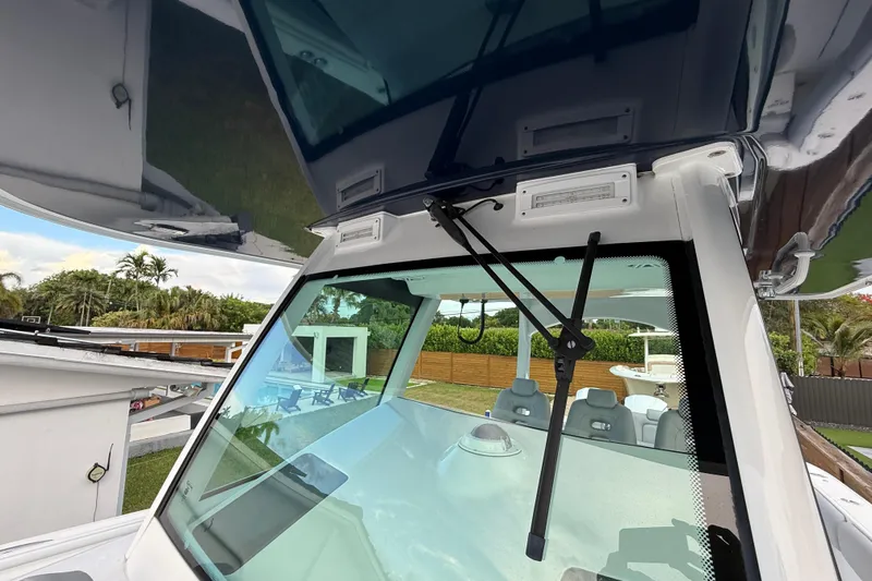 Slide: The Image of 2020 HCB 39 Speciale boat windshield and cockpit view. - 23