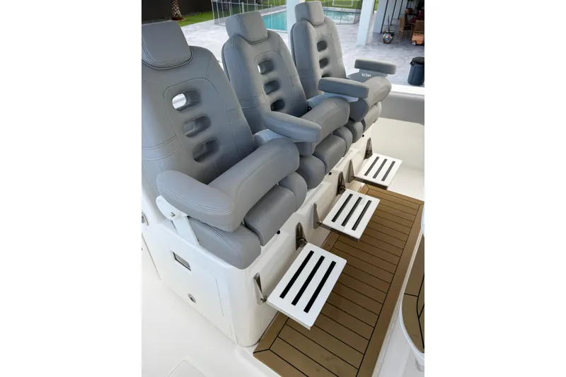 Slide: The Image of Luxury seating on 2020 HCB 39 Speciale boat with footrests and cushioned armchairs. - 26