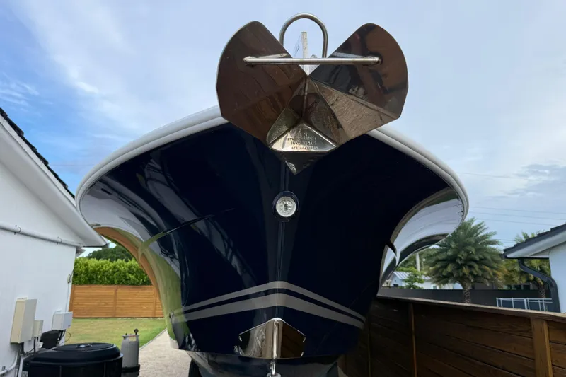 Slide: The Image of Front view of a 2020 HCB 39 Speciale boat with a shiny anchor. - 29