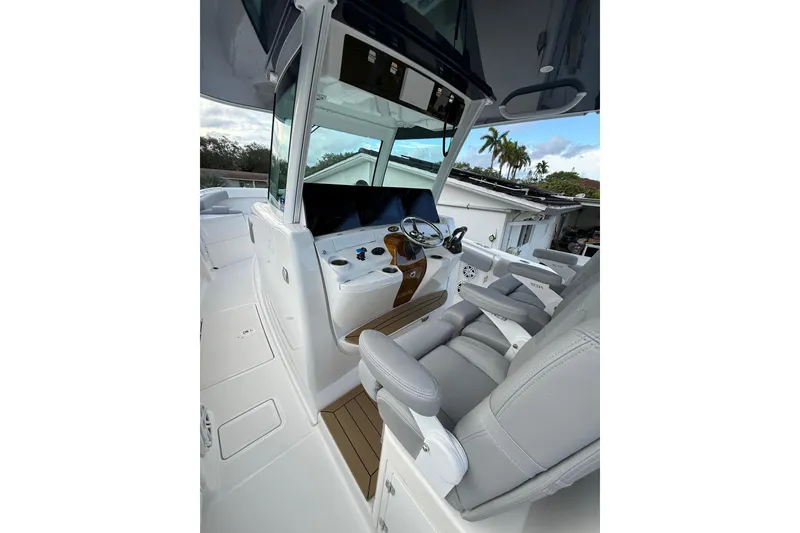 Slide: The Image of 2020 HCB 39 Speciale boat interior with modern helm and seating. - 5
