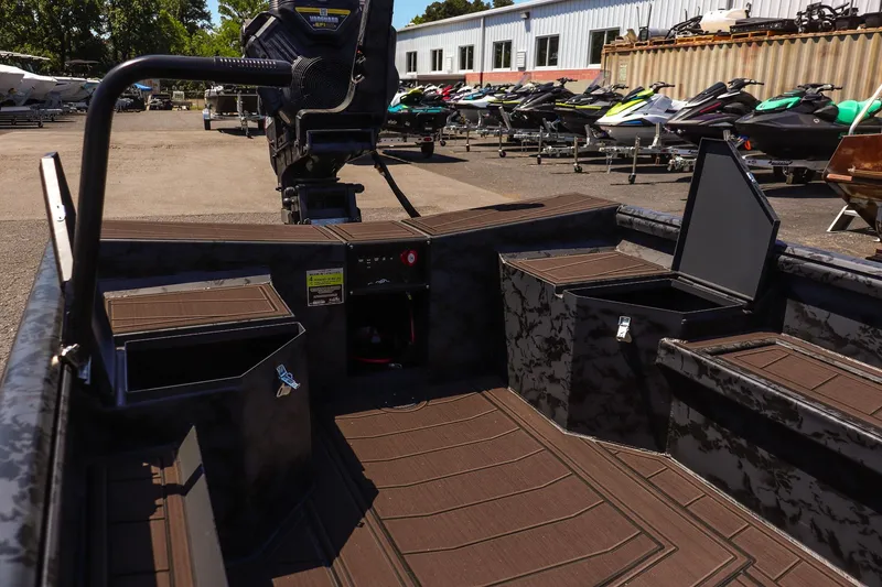 Slide: The Image of 2026 Gator Tail 17/50 MID DECK SAVAGE SERIES boat interior with storage compartments. - 15