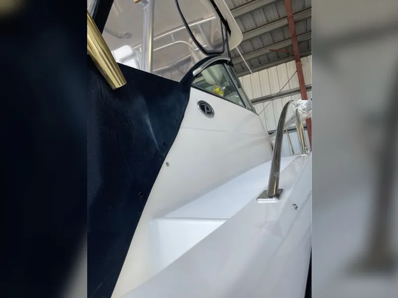 Slide: The Image of Close-up of a 2004 Pursuit 3070 Offshore yacht in storage. - 13