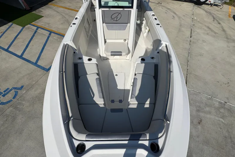 Slide: The Image of 2026 Sailfish 232 CC boat interior with spacious seating and modern design. - 18
