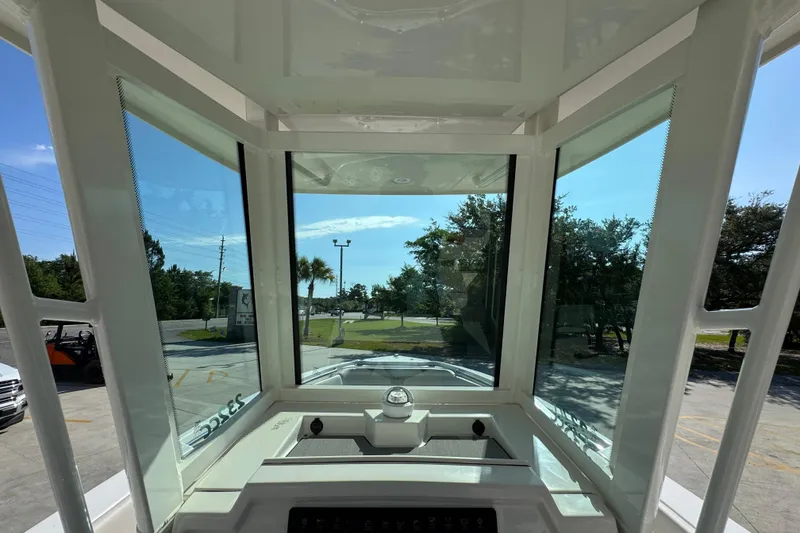 Slide: The Image of Interior view of 2026 Sailfish 232 CC boat, showcasing windshield and dashboard. - 30
