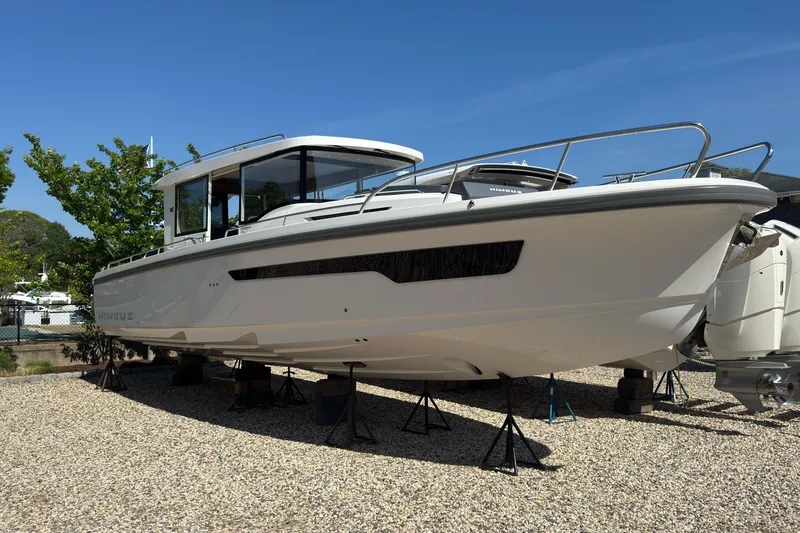 The Image of Nimbus Commuter 11 boat 2025 on gravel, side view. - 1