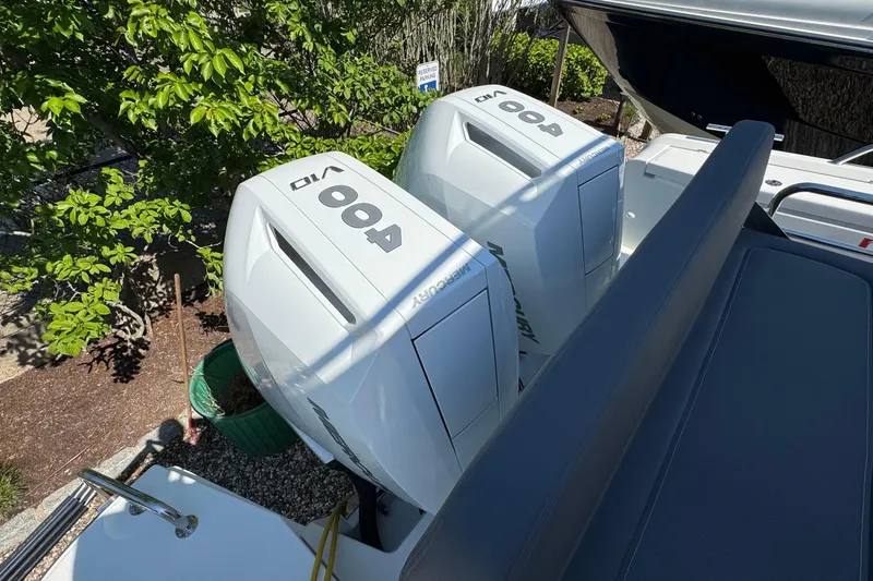 Slide: The Image of Nimbus Commuter 11 2025 with dual 400 HP outboard engines. - 13