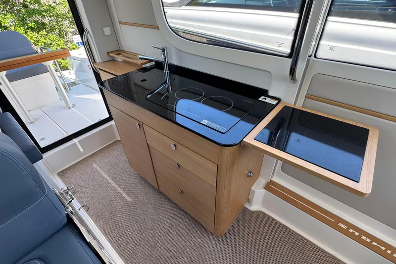 Slide: The Image of Interior of Nimbus Commuter 11 yacht, modern kitchen, 2025 model. - 18