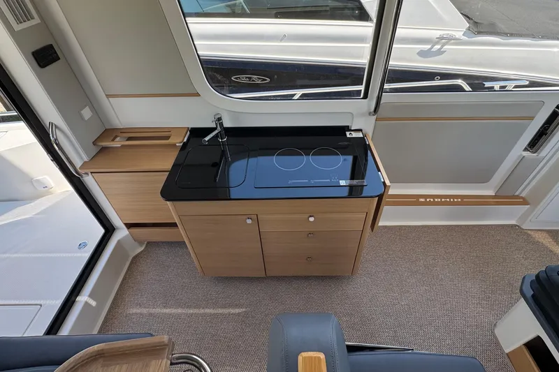 Slide: The Image of Interior of Nimbus Commuter 11 yacht, modern kitchen, 2025 model. - 23