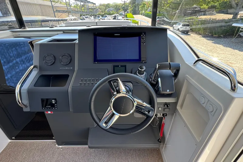 Slide: The Image of Control console of Nimbus Commuter 11 boat, year 2025. - 25
