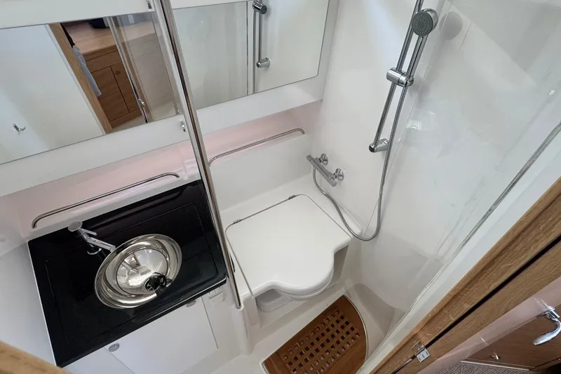 Slide: The Image of Nimbus Commuter 11 bathroom with shower and sink, 2025 model. - 36