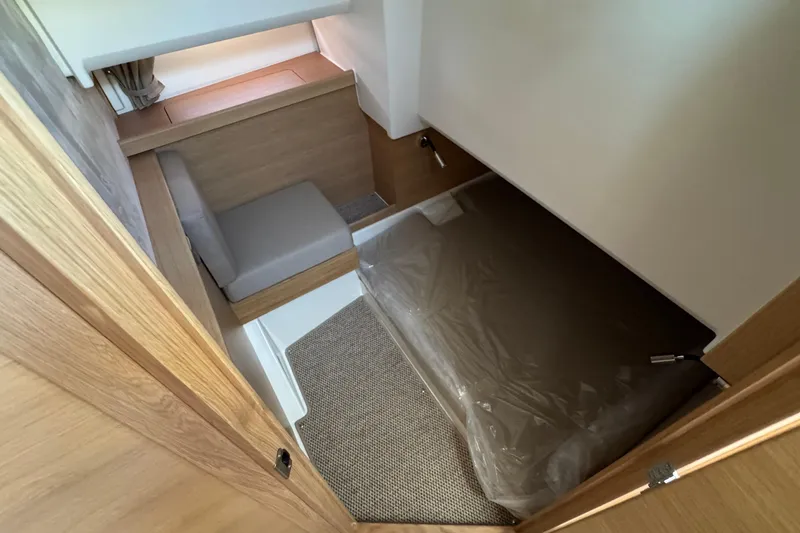 Slide: The Image of Interior of Nimbus Commuter 11 boat, 2025 model, featuring sleeping area. - 38