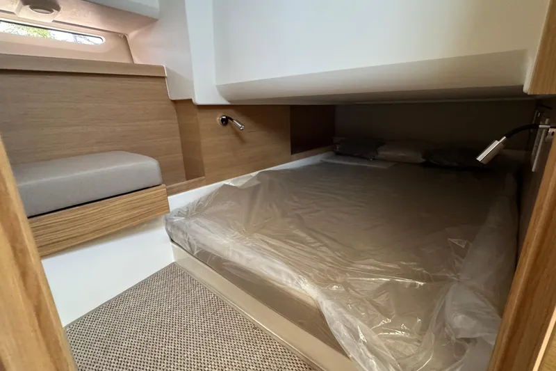 Slide: The Image of Interior of Nimbus Commuter 11 yacht, 2025 model, featuring sleeping area. - 39