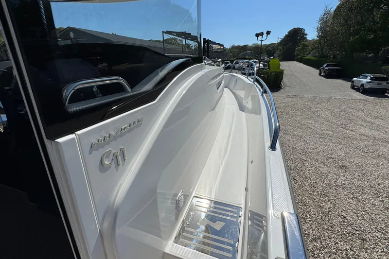 Slide: The Image of Nimbus Commuter 11 boat, 2025 model, side view outdoors. - 43