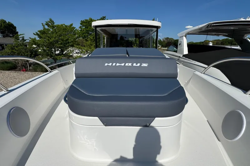 Slide: The Image of Nimbus Commuter 11 boat 2025 with blue seating cushion. - 47