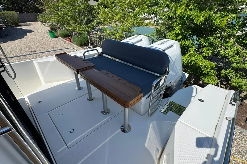 Slide: The Image of Nimbus Commuter 11 2025 with outdoor seating and table. - 9