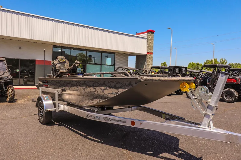 The Image of 2026 Gator Tail 17/50 MID DECK SAVAGE SERIES boat on trailer, dealership background. - 1