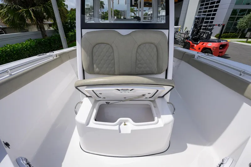 Slide: The Image of 2023 Sportsman Open 302 Center Console boat with open storage compartment. - 14