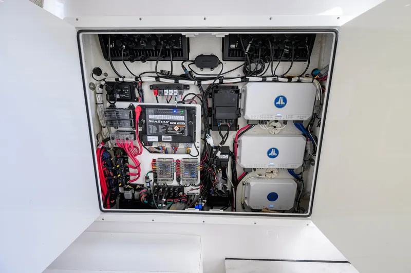 Slide: The Image of 2023 Sportsman Open 302 Center Console electrical panel with advanced wiring and components. - 34