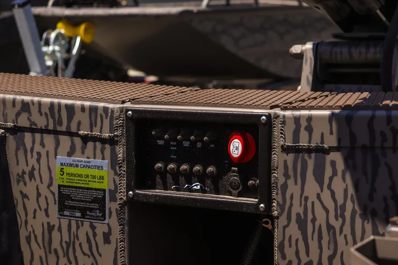 Slide: The Image of Control panel of 2026 Gator Tail 18/60 Extreme Series boat with camouflage design. - 11