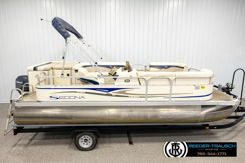 The Image of 2008 Sedona 20 CR pontoon boat on trailer, featuring Yamaha outboard motor. - 1