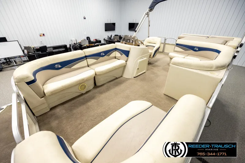 Slide: The Image of Interior of a 2008 Sedona 20 CR pontoon boat with beige seating. - 10