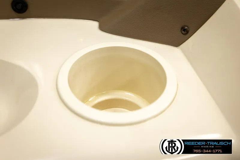 Slide: The Image of Cup holder in 2008 Sedona 20 CR boat interior, Reeder-Trausch Marine branding. - 31