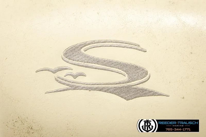 Slide: The Image of Embroidered Sedona 20 CR 2008 logo with birds, Reeder-Trausch Marine branding. - 34