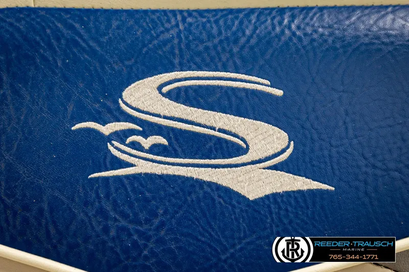 Slide: The Image of Blue leather with embroidered "S" logo, Sedona 20 CR 2008, Reeder-Trausch Marine branding. - 36