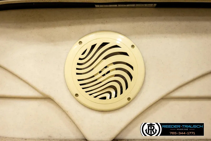 Slide: The Image of Speaker grille on a 2008 Sedona 20 CR boat, featuring a wavy design pattern. - 37