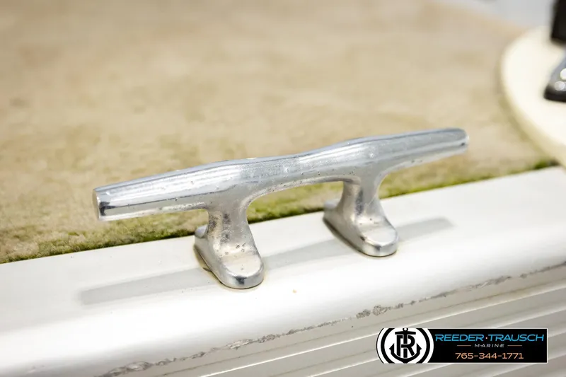 Slide: The Image of Close-up of a 2008 Sedona 20 CR boat cleat on a textured surface. - 45